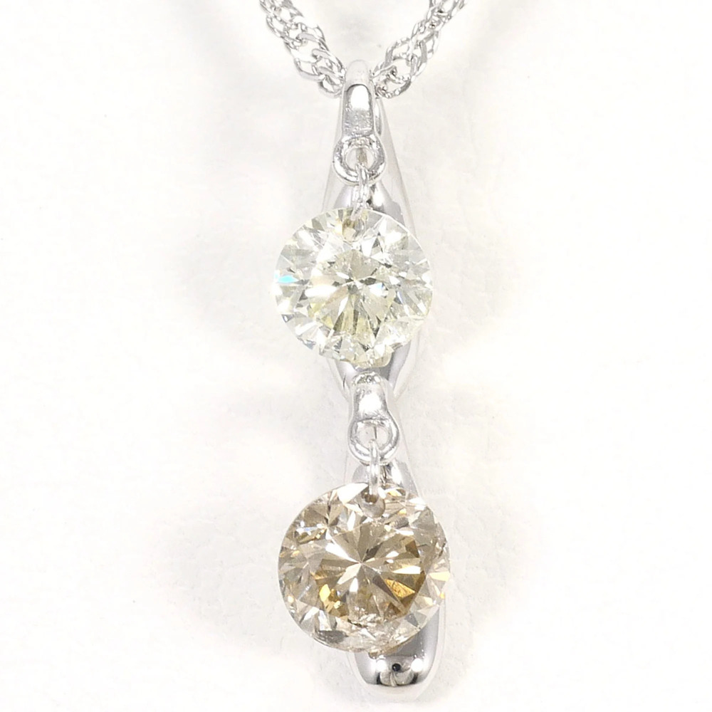 18K (18-karat white gold) necklace with diamonds and brown diamonds, includes...